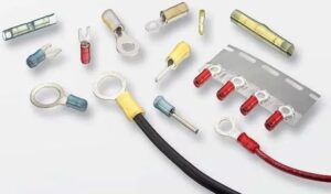 Solderless terminals and connectors for wire harness connections